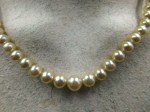 16 in pearls 10k close